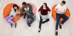 Four students practice speaking english